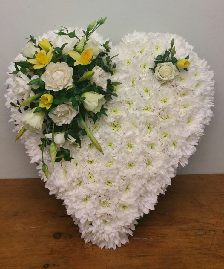 based white and yellow flower heart pad tribute