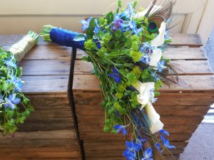 bridal-bouquet-orchid-peacock-feather-side