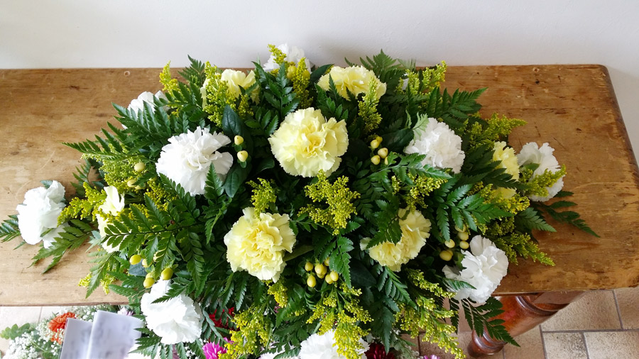 Double ended spray - white and yellow carnation with solidago and berries