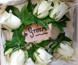 White rose groom, best man and usher buttonholes