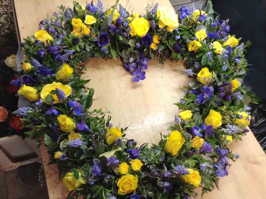 23 inch blue and yellow Open Heart Wreath