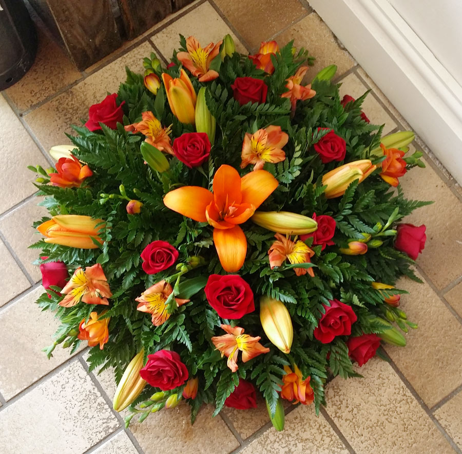 Posy pad - 16 inch loose flower tribute - red rose, orange lily and alstromeria