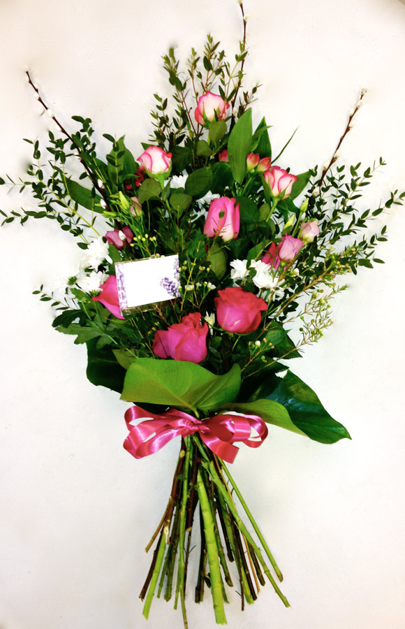 Handtied sheaf - pink and white roses and lisianthus
