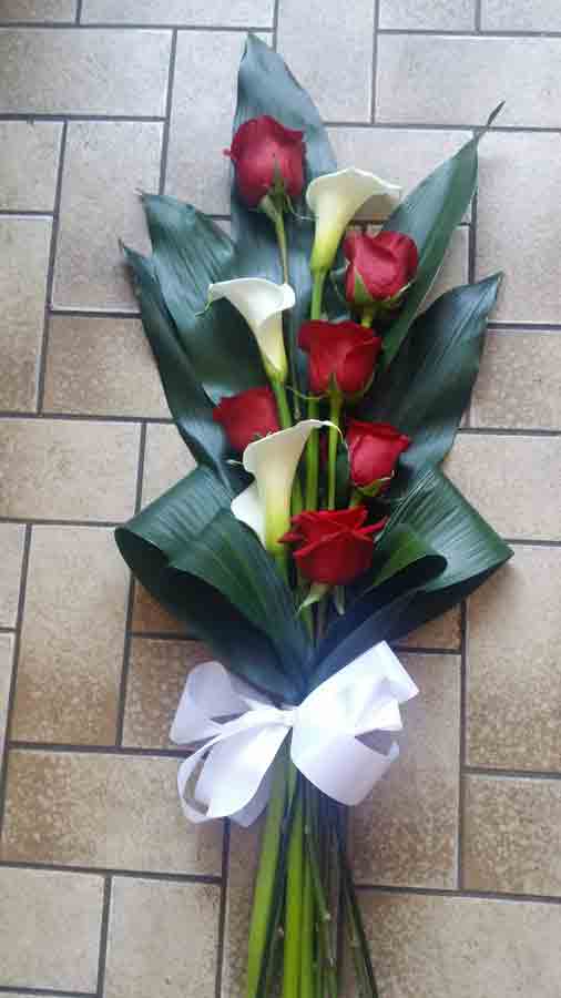 Handtied sheaf - red rose and white calla lily