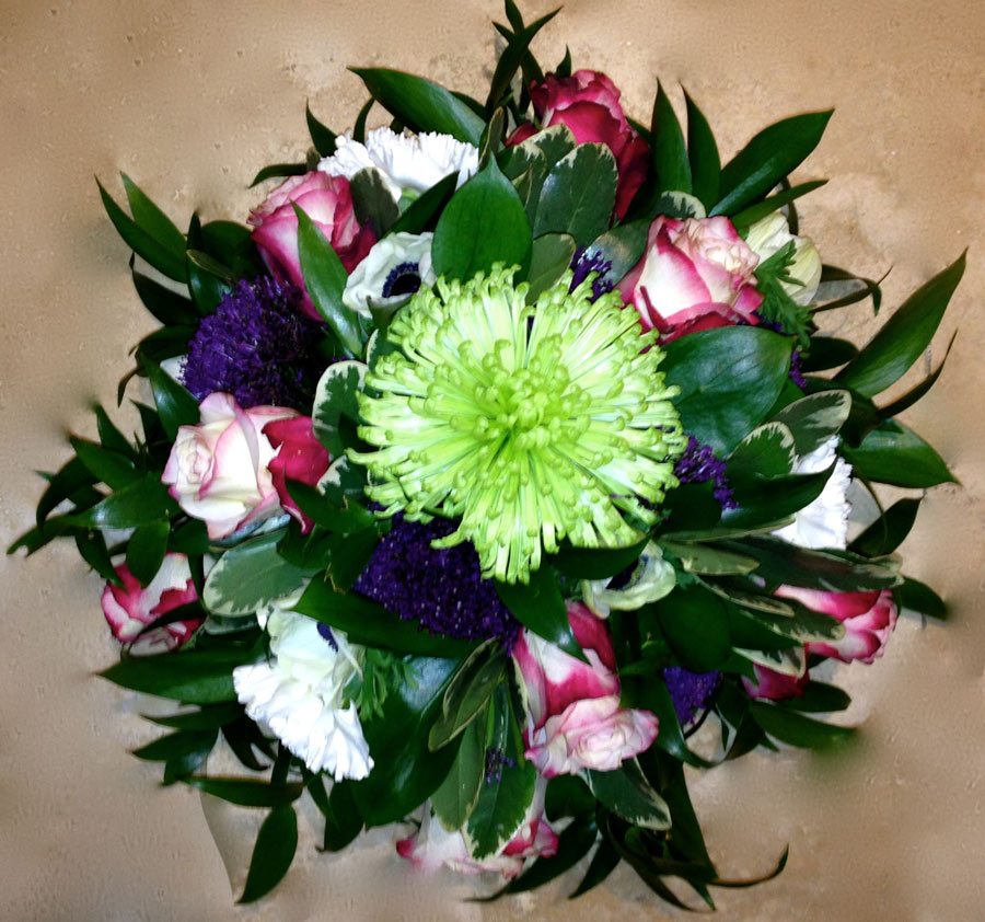 Small posy in a dish - pink roses, green chrysanthemum spray and purple mix