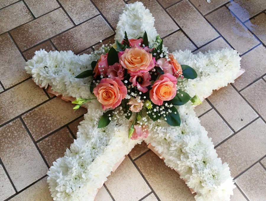 Based star shaped tribute - pink roses, white chrysanthemum spray, lisianthus and gypsophila