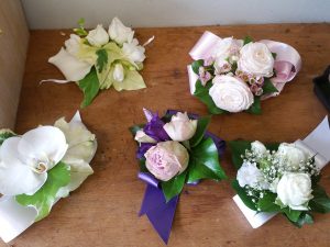 Rose and orchid wrist corsage examples