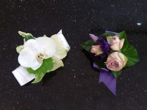Pink rose and white orchid wrist corsages - perfect for weddings or proms