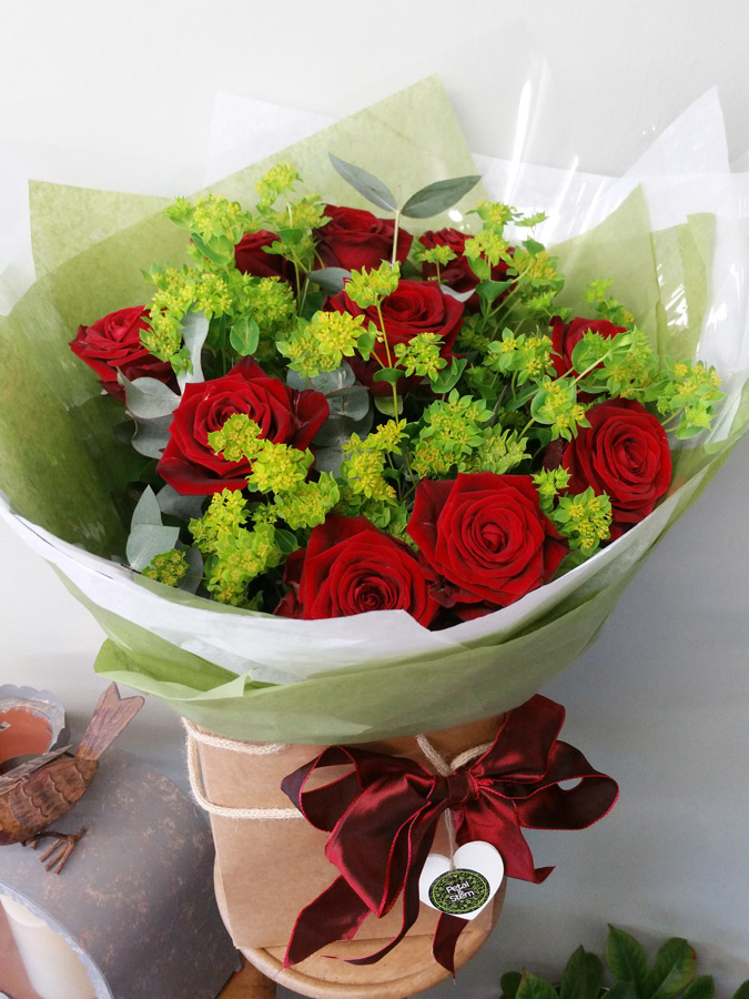 Dozen handtied red roses valentine bouquet