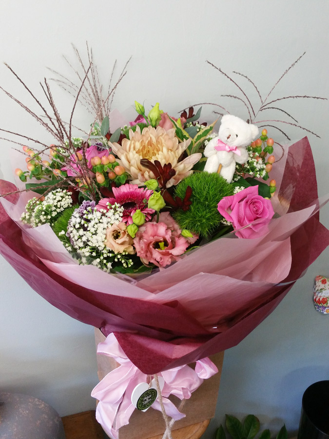 New baby girl mixed flower handtied gift bouquet aqua pack