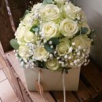 White rose and gypsophila bridal bouquet packed