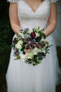 Paper Comic Book Flowers amongst real flowers in bridal bouquet